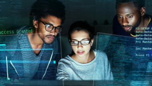 Cybersecurity team analyzing data on computer screens, IT training and tech teamwork concept