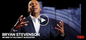 Bryan Stevenson delivering TED Talk titled 'We Need to Talk About an Injustice', powerful social justice speech with TED logo