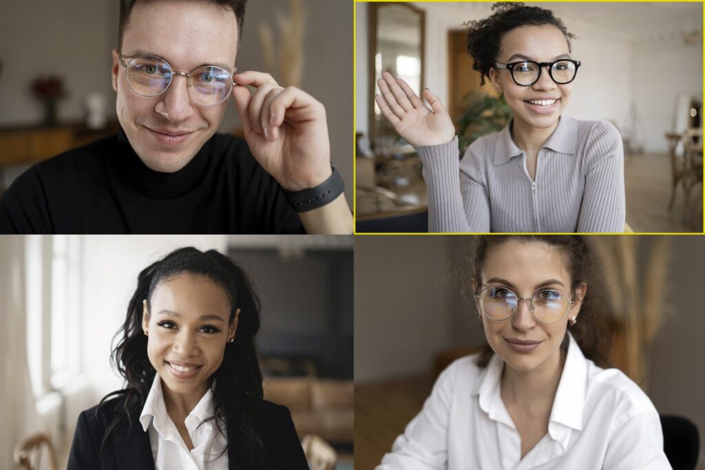 Four colleagues meet in a small video call breakout group